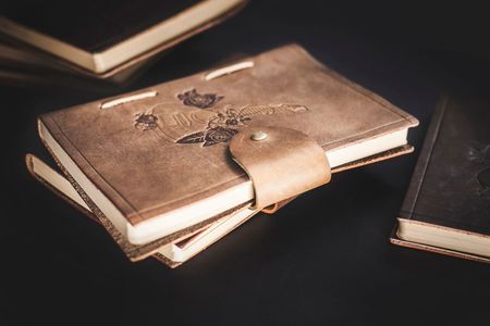 Muistikirja/Notebook omalla logolla tai aihiolla